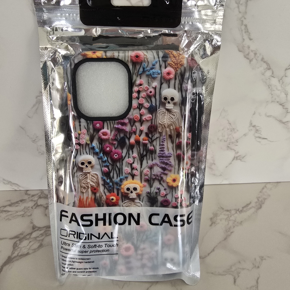 IPhone 15 Pro Max Skeletons and Flowers Phone Case - New and Unopened Package
